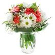Displaying freshness and understated charm, this hand-arranged bouquet from a New Addington florist showcases a lively gathering of coral-pink carnations and snowy white daisies and chrysanthemums, evoking the gentle optimism of a spring sunrise over local greens. The carnations, full and plush, provide the vibrant heart of the arrangement, their ruffled petals radiating warmth and movement. Scattered throughout, crisp multi-layered daisies open their vivid green-yellow centers like cheerful beacons, recalling familiar faces at the corner of Vulcan Way. Sprigs of baby's breath add a delicate touch, their frothy, cloud-like blossoms lightening the composition in a subtle dance with the sunlight. Rich green foliage-some broad and glossy, others slender and arching-forms a handsome collar around the vase, enhancing each bloom and tying the arrangement together with natural grace. Half-hidden, a few magenta alstroemeria buds promise fresh colour in days to come. The entire display stands in a clear glass vase with gleaming water, the stems robust beneath the surface, while the pure white backdrop keeps every detail bright, uncluttered, and inviting. This bouquet is well-suited for gifting comfort, celebrating new chapters, or simply sharing a sense of joy with neighbours along King Henry's Drive-a true reflection of New Addington's welcoming spirit.